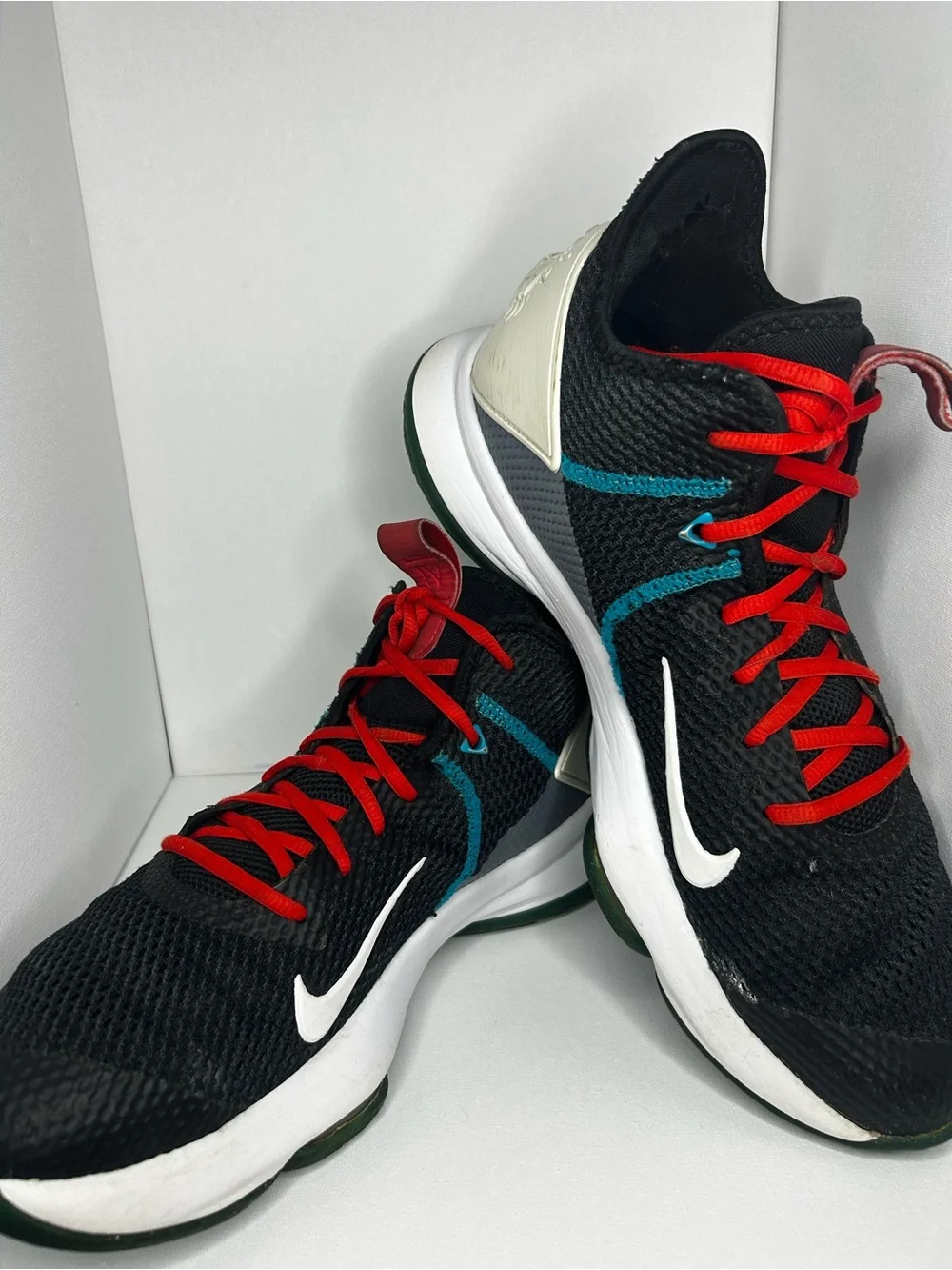 Nike Men’s Black Sneakers with Red Laces and Teal Accents